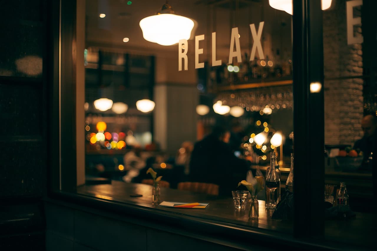 A cafe window lit up in the evening